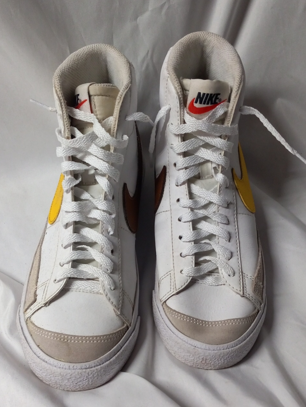 Nike Men’s White High-Top Sneakers with Yellow and Brown Swooshes